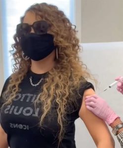 Watch Mariah Carey Hit The Iconic Whistle Note While Getting Her COVID Vaccine... ?